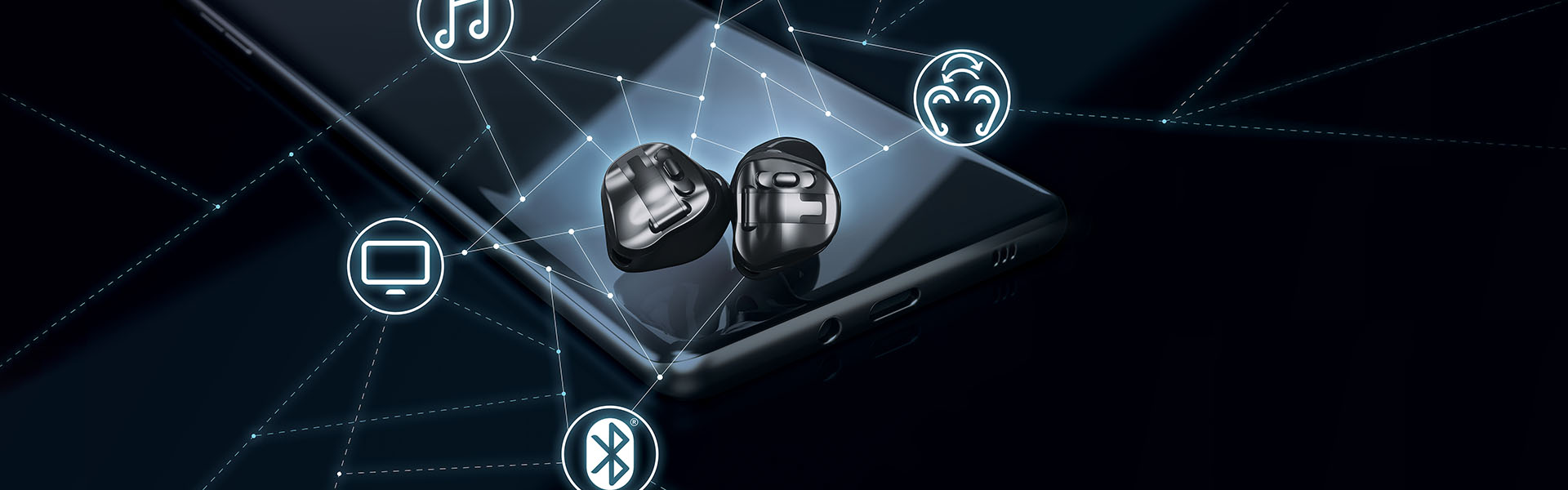 Hörgeräte liegen auf einem Smartphone mit Symbolen für Bluetooth und moderne Hörtechnologie